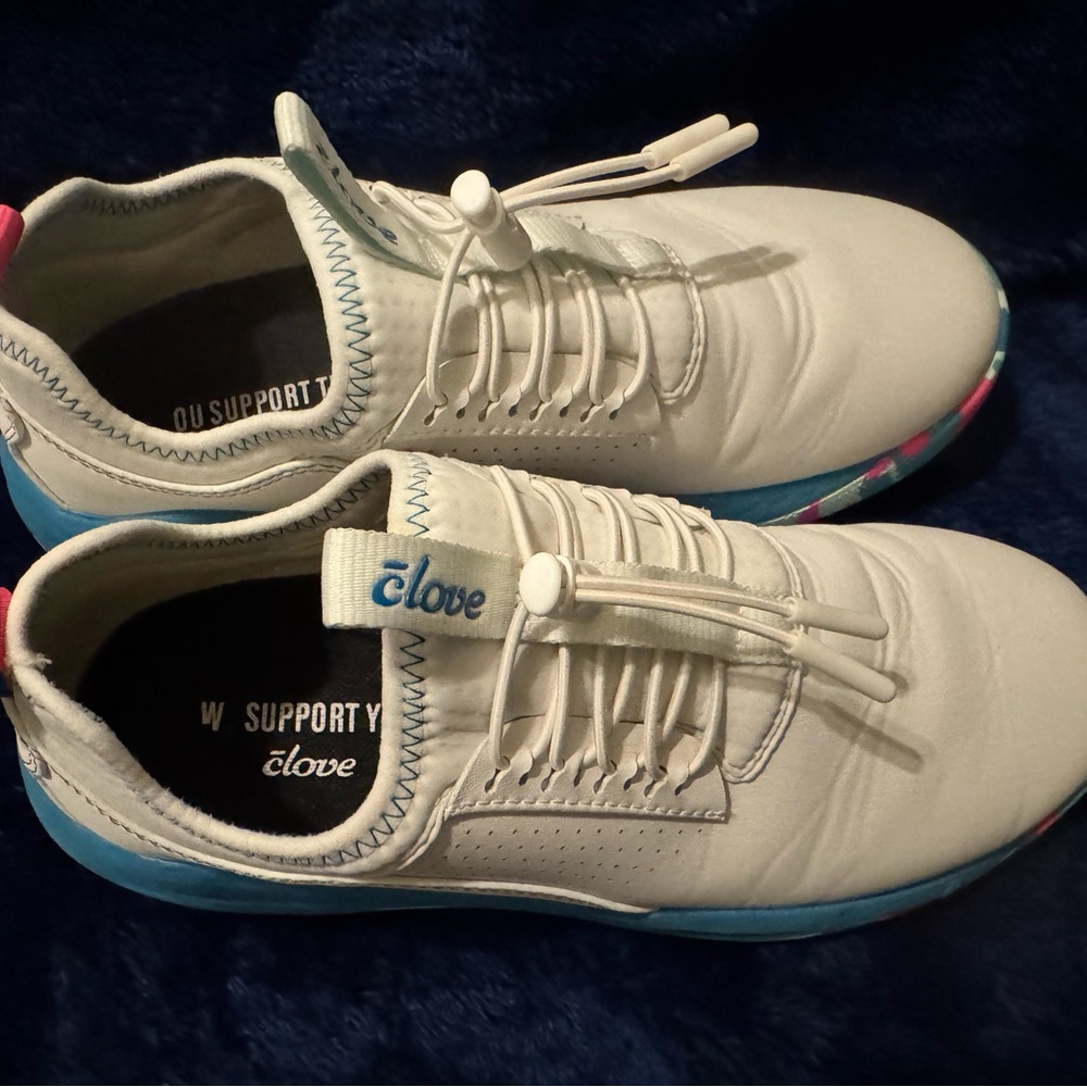 White and Blue Athletic Shoes with Sleek Design